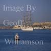 GW01970-50 = Cutty Sark Tall Ship Dar Mlodziezy (Poland) leaving Palma de Mallorca (plus Castillo de San Carlos) and Port Pilot Launch, Mallorca, Baleares, Spain. 