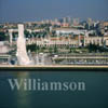 GW02990-32 = Aerial view of Monument to the Discoverers + Mosteiro dos Jeronimos (Jeronimos Monastery) and Marinas in Belem district of Lisbon, Portugal.