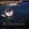 GW19745-50 = View in Cala Sa Nau ( sailing boats + swimmers ) South of Portocolom, SW. Mallorca, Balearic Islands, Spain. 21st September 2004.