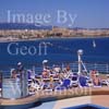 GW21160-50 = P&O Line flagship cruise liner Arcadia in the Port of Palma de Mallorca ( view over the stern aquarius pool towards the famous gothic Cathedral and Almudaina ) during her inaugural cruise, Palma de Mallorca, Balearic Islands, Spain. 25th April 2005. 