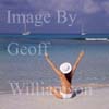 GW22940-50  = Topless young lady enjoying the sun and sea on Es Trenc beach ( Playa Es Trenc ), SE Mallorca, Balearic Islands, Spain.GW22940-50