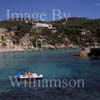 GW22520-50 = Scene at Camp de Mar ( view over bay with pedalo, restaurant island, and hillside villas ), SW Mallorca, Balearic Islands, Spain.