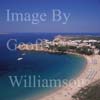 GW27610-60 = Aerial view - beach + bay +moored leisure craft + headland looking Eastwards - Arenal d'en Castell, North Coast of Menorca, Balearic Islands, Spain. 20th September 2006. 