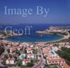 GW27650-60 = Aerial view - properties + beach + bay+ leisure craft + headlands looking North - Arenal d'en Castell, North Coast of Menorca, Balearic Islands, Spain. 20th September 2006.