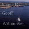 GW27890-60 = Aerial view - yacht sailing along picturesque coast - South West Menorca, Balearic Islands, Spain. 20th September 2006. 