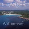 GW27895-60 = Aerial view - leisure craft at anchor in remote cala / cove with long sandy beach - South West Menorca, Balearic Islands, Spain. 20th September 2006. 