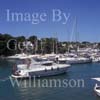 GW29595-60 = Morning scene looking West at entrance to Cala D'Or Marina - with motor yacht entering and moored sail and motor yachts - Cala D'Or, Santanyi, South East Mallorca, Balearic Islands, Spain. 7th July 2007.