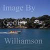 GW29605-60 = Morning scene looking West near entrance to Cala D'Or Marina - with Sea Rider high speed RIB passing luxury coastal properties - Cala D'Or, Santanyi, South East Mallorca, Balearic Islands, Spain. 7th July 2007.