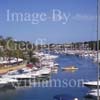 GW29675-60 = Late afternoon view looking East over Cala D'Or Marina - with moored motor and sailing yachts and Sea Rider High Speed RIB moving onto mooring - Cala D'Or, Santanyi, South East Mallorca, Balearic Islands, Spain. 7th July 2007.