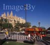 GW30080-60 = Almudaina Royal Palace and historic Gothic Cathedral ( also known as La Seu and built between 1230 and 1601 ) plus red open topped tourist bus and tourists, Palma de Mallorca, Balearic Islands, Spain.5th September 2007.