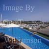 GW30115-60 = Scene at Cala D'Or Yacht Club - swimmers in pool overlooking Marina of Cala D'Or, Cala D'Or, Ajuntamiento de Santanyi, South East Mallorca, Balearic Islands, Spain. 11th September 2007. Model Release.