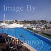 GW30120-60 = Scene at Cala D'Or Yacht Club - swimmers in pool overlooking Marina of Cala D'Or, Cala D'Or, Ajuntamiento de Santanyi, South East Mallorca, Balearic Islands, Spain. 11th September 2007. Model Release.