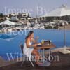 GW30220-60 = Scene at Cala D'Or Yacht Club - delicious poolside snack - overlooking Marina of Cala D'Or, Cala D'Or, Ajuntamiento de Santanyi, South East Mallorca, Balearic Islands, Spain. 11th September 2007. Model Release.