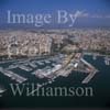 GW31145-60 = Aerial view over Real Club Nautica de Palma ( Palma Royal Yacht Club ), sailing and motor yachts, boat repair facilities and slips, and the City of Palma de Mallorca, Port of Palma de Mallorca, Balearic Islands, Spain. 15th August 2003.