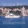 GW32272-60 = Johnson 105 luxury 32 mtr motor yacht / superyacht undertaking a demo spin en route for Palma International Boat Show 2008 with Paseo Maritimo in the background, Port of Palma de Mallorca, Balearic Islands, Spain. 25th April 2008.