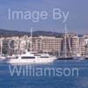 GW32275-60 = Johnson 105 luxury 32 mtr motor yacht / superyacht undertaking a demo spin en route for Palma International Boat Show 2008 with Paseo Maritimo and luxury Hotel Melia Palas Atenea in the background, Port of Palma de Mallorca, Balearic Islands, Spain. 25th April 2008.