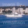 GW32285-60 = Johnson 105 luxury 32 mtr motor yacht / superyacht undertaking a demo spin en route for Palma International Boat Show 2008 with Belver Castle and Paseo Maritimo in the background, Port of Palma de Mallorca, Balearic Islands, Spain. 25th April 2008.