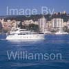 GW32320-60 = Boat Show Bound - Sanlorenzo SL88 motor yacht ( with Belver Castle and Paseo Maritimo in the background ) heading for Palma International Boat Show 2008 in Old Port ( Moll Vell / Muelle Viejo ) Area of the Port of Palma de Mallorca, Balearic Islands, Spain. 24th April 2008.