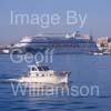 GW32360-60 = Boat Show Bound ???- traditional Balearic wooden llaut ( with Aidacara cruise ship in the background ) heading for Palma International Boat Show 2008 in Old Port ( Moll Vell / Muelle Viejo ) Area of the Port of Palma de Mallorca, Balearic Islands, Spain. 24th April 2008.