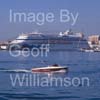 GW32410-60 = Boat Show Bound - motor launch with Cruise ship AIDAcara in the background heading for Palma International Boat Show 2008 in Old Port ( Moll Vell / Muelle Viejo ) Area of the Port of Palma de Mallorca, Balearic Islands, Spain. 24th April 2008.