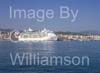 GW33765-60 = Royal Caribbean International Cruise Ship "Navigator of the Seas" ( 311 meters ) with historic Belver Castle on hilltop in front, yachts and superyachts on RHS, in the Port of Palma de Mallorca, Balearic Islands, Spain. 21st October 2008.