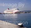 GW33770-60 = Cruise ship "Ocean Villafge Two" and historic Porto Pi lighthouse behind, in the Port of Palma de Mallorca, Balearic Islands, Spain. 21st October 2008.