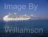 GW33820-60 = Royal Caribbean International Cruise Ship "Navigator of the Seas" ( 311 meters ) departing the Port of Palma de Mallorca with Almudaina Castle and famous historic Palma Gothic Cathedral ahead, Balearic Islands, Spain. 21st October 2008.