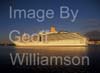 GW33865-60 = P&O Line cruise liner Arcadia entering port at sunrise ( with the historic Porto Pi lighthouse ahead ) - Port of Palma de Mallorca, Balearic Islands, Spain. 18th November 2008.