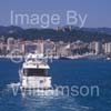 GW34060-60 = Sanlorenzo SL72 (22 mtrs) luxury superyacht entering the Port of Palma de Mallorca ( with historic Bellver Castle ahead ), Balearic Islands, Spain. 23rd April 2009. 