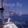 GW35807-60 = Formentor Headland and Lighthouse ahead - Sailing in North East Mallorca with A1 Sailing -on sailing yacht xxx in company with sailing yacht Indulgence (Jeanneau Sun Odyssey 36) - near Alcudia and Pollensa, Mallorca Balearic Islands, Spain.  13th July 2010. Model Releases.