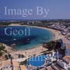 GW27750-60 = Aerial view - section of bay + beach + hotels with anchored leisure craft looking East - Arenal d'en Castell, North Coast of Menorca, Balearic Islands, Spain. 20th September 2006. 